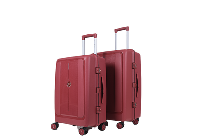 Two hard-shell spinner suitcases in a deep red color, shown on a plain white background. The larger suitcase is positioned in front of the smaller one, both with their telescoping handles extended.