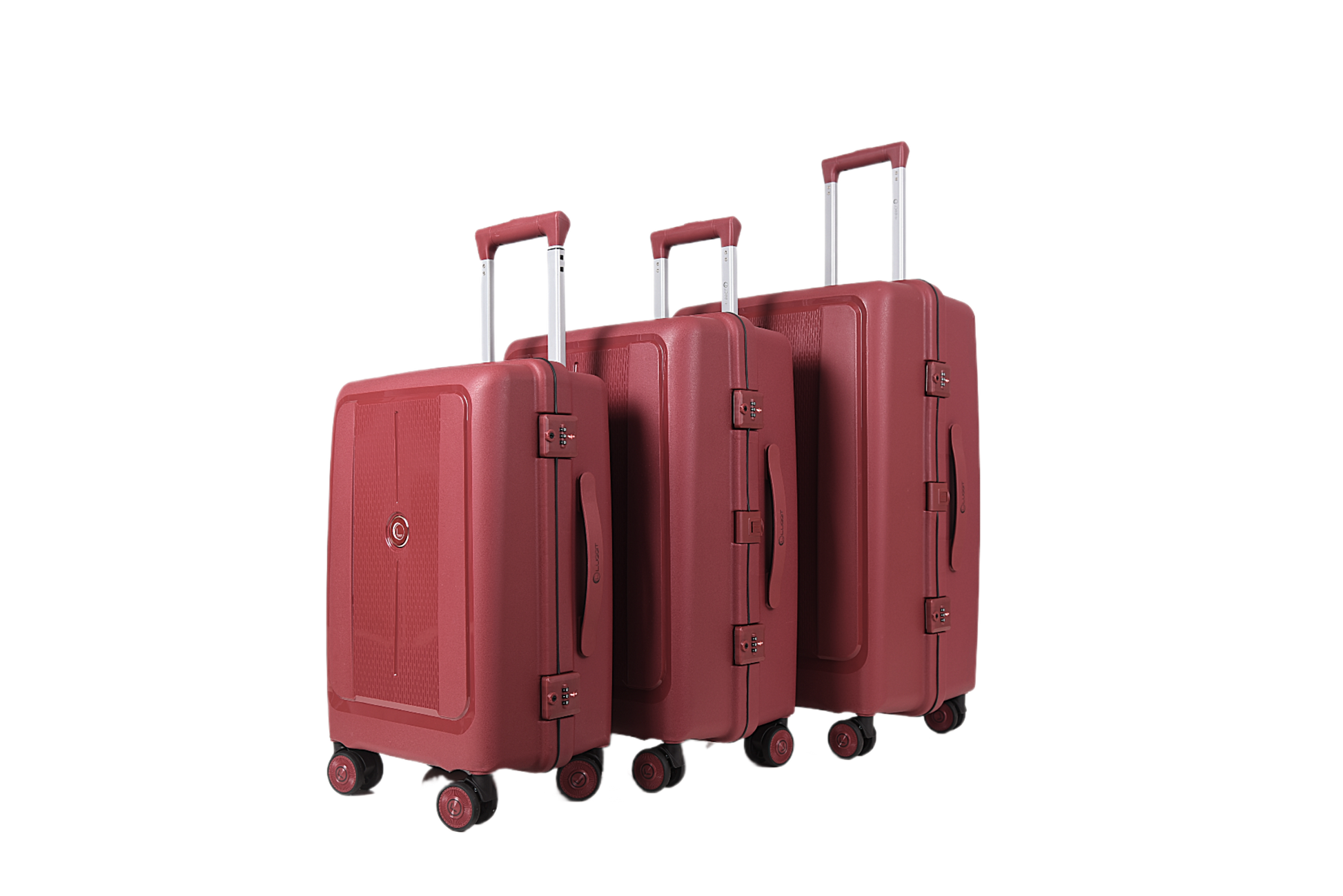 Three-piece hardshell luggage set in a dusty rose red color, featuring telescoping handles, spinner wheels, and a small circular metal emblem on the front of each suitcase, shown against a plain white background.