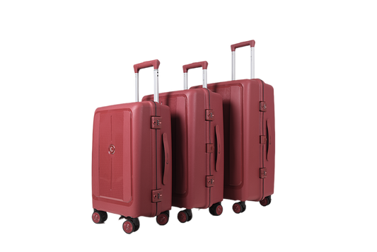 Three-piece hardshell luggage set in a dusty rose red color, featuring telescoping handles, spinner wheels, and a small circular metal emblem on the front of each suitcase, shown against a plain white background.