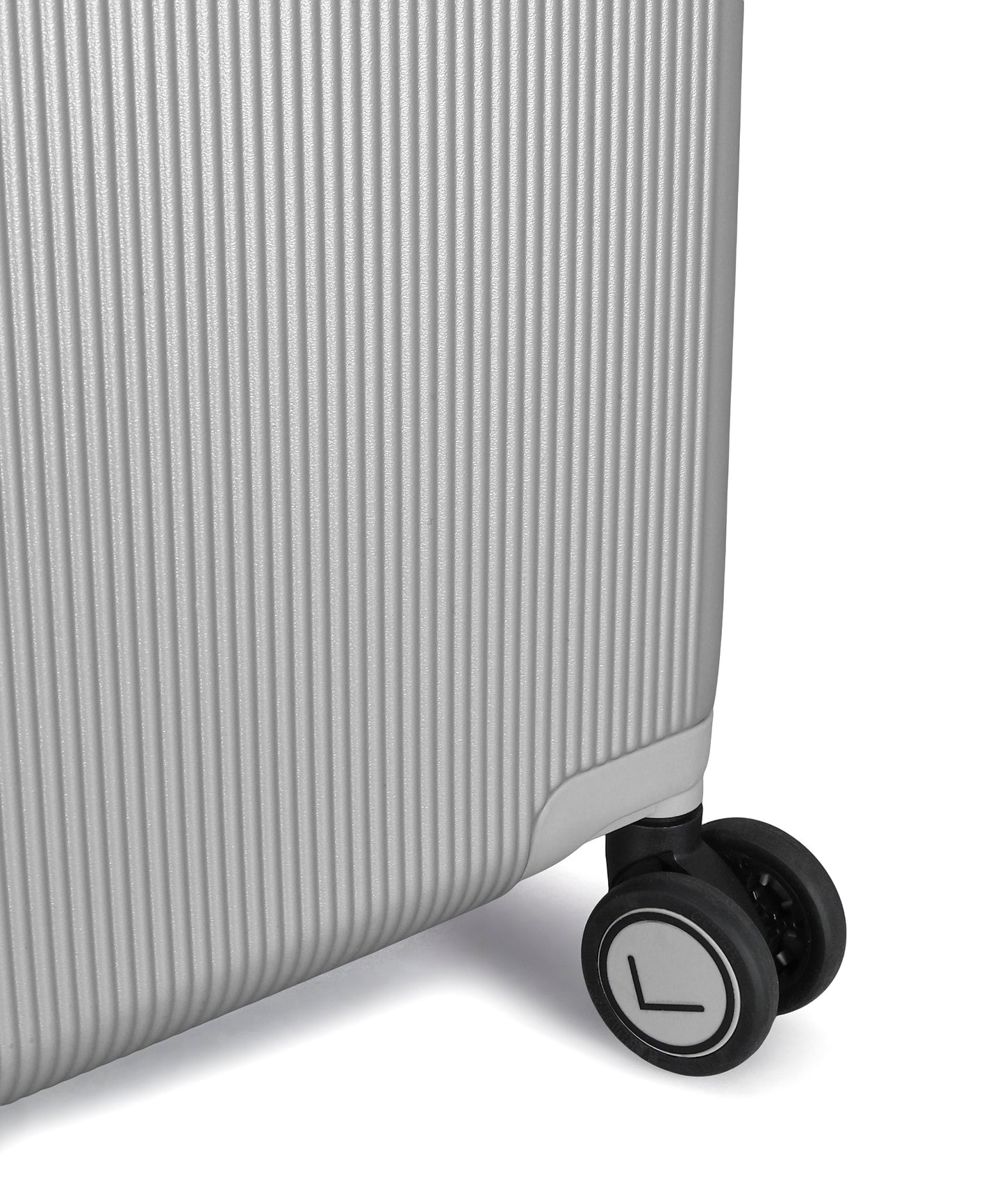 Close-up of a suitcase wheel on a white background