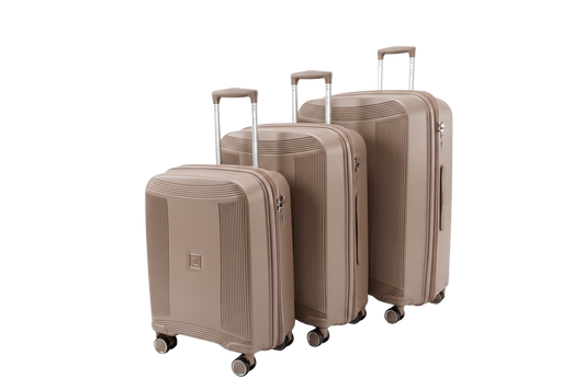 Three-piece hardshell spinner luggage set of 3 in a matching taupe-beige color, featuring telescoping handles and four wheels each, shown on a solid white background. scratch-resistant expandable luggage
