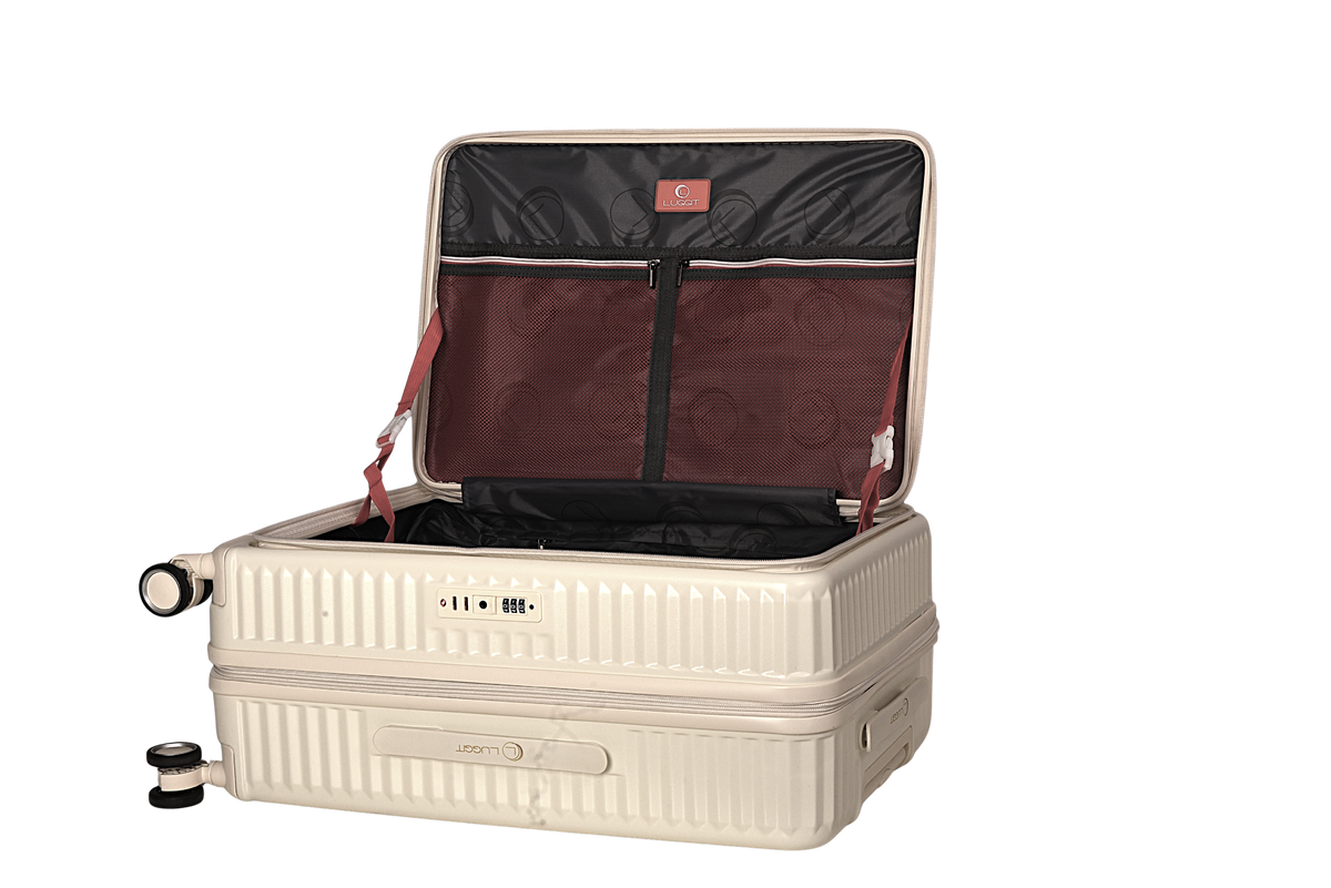 A cream-colored hard-shell suitcase with its lid open, showing a black exterior lining and a burgundy interior organizer panel. The suitcase features a textured ribbed design, a digital lock, and telescoping wheels.