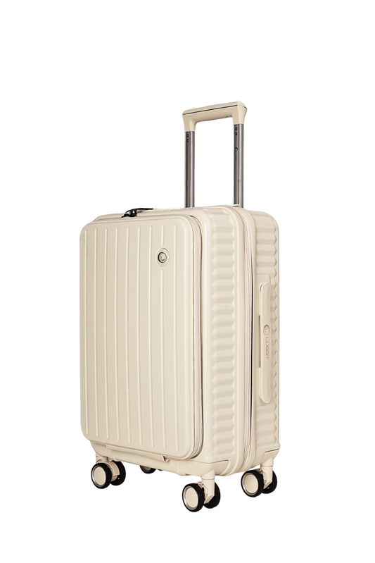 A cream-colored hardshell spinner suitcase with a telescopic handle extended, shown on a plain white background.