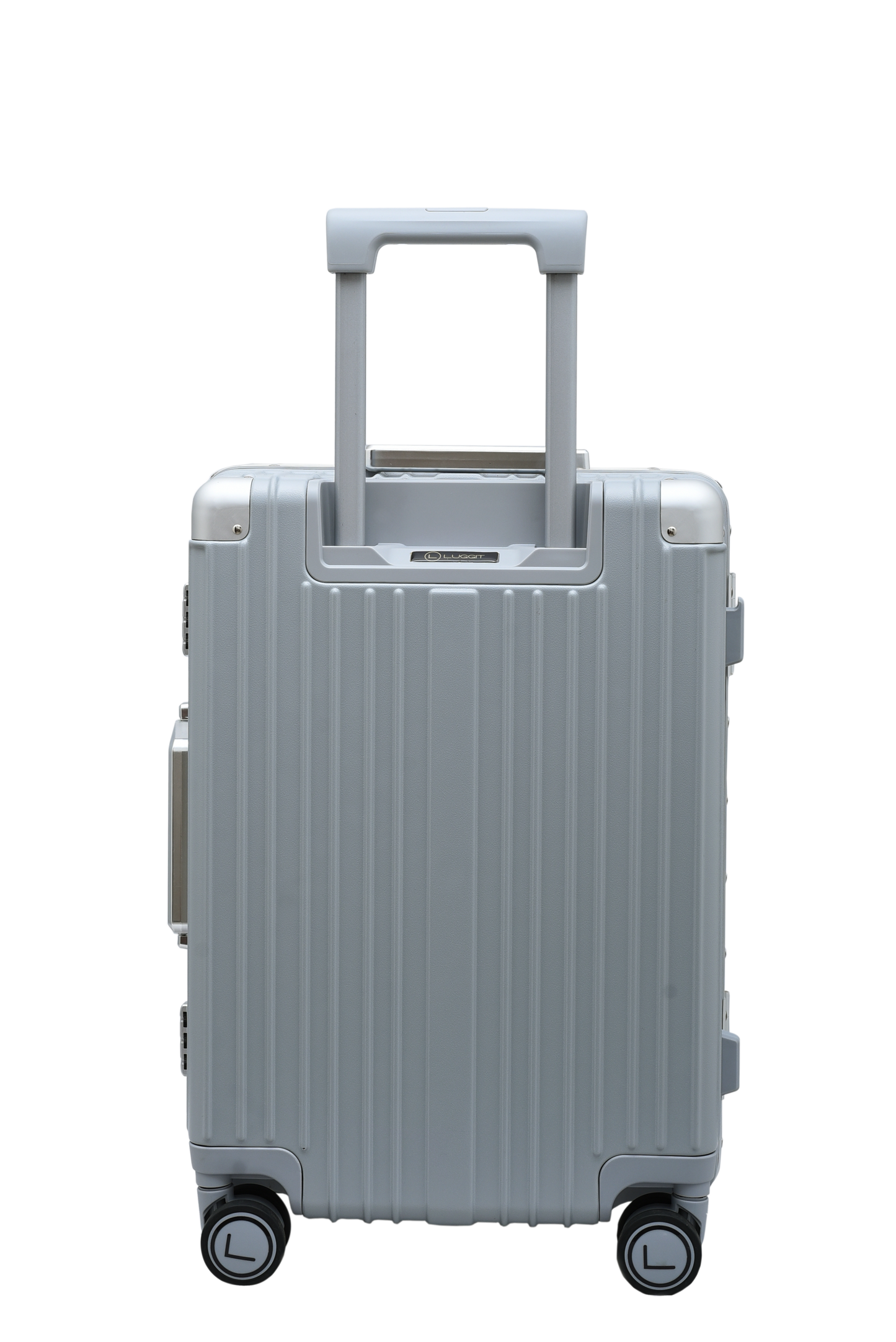 Silver suitcase with a ribbed texture on a white background luggit