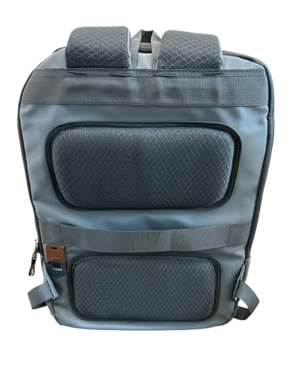 Gray backpack with quilted design on a luggit