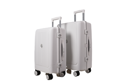 Two hard-shell spinner suitcases in a light gray or off-white color, shown on a plain white background. The smaller suitcase is positioned in front of the larger one, both with telescoping handles extended.