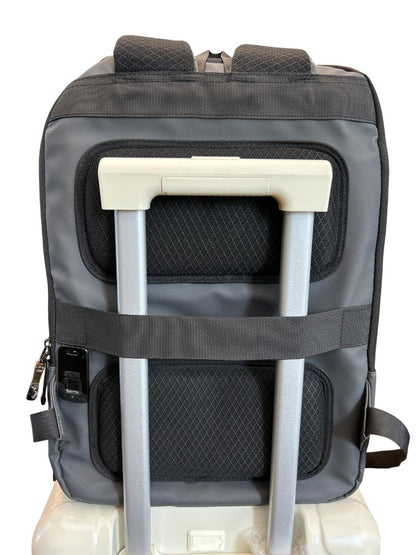 Gray backpack with a built-in handle and wheels on a white background