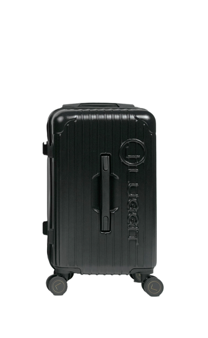 Black suitcase with 'Tumi' branding on a white background