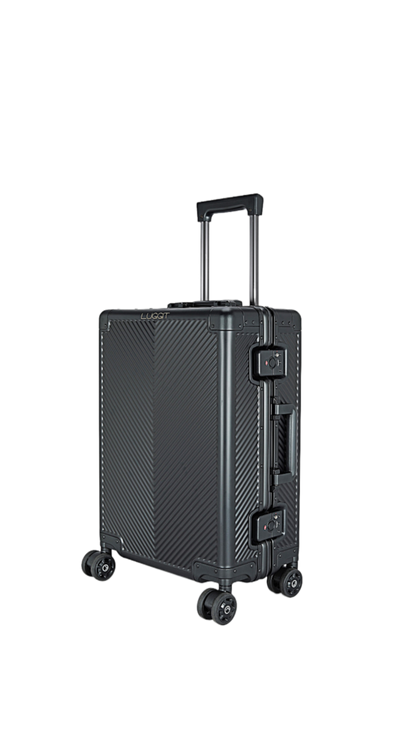 Black suitcase with a textured surface on a white background