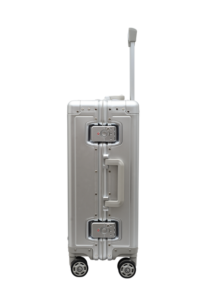 Silver suitcase with wheels and handle on a white background