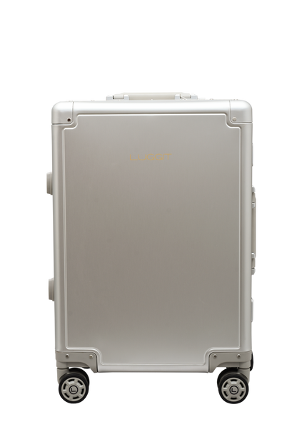 Silver suitcase with wheels on a white background