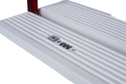 White step stool with textured surface and control buttons on a white background