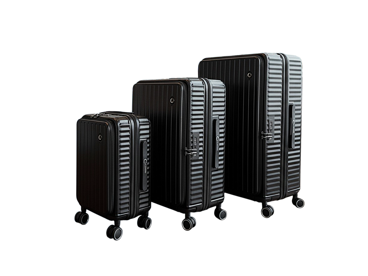 Three-piece black hard-shell spinner luggage set with a ribbed texture, shown on a solid white background.