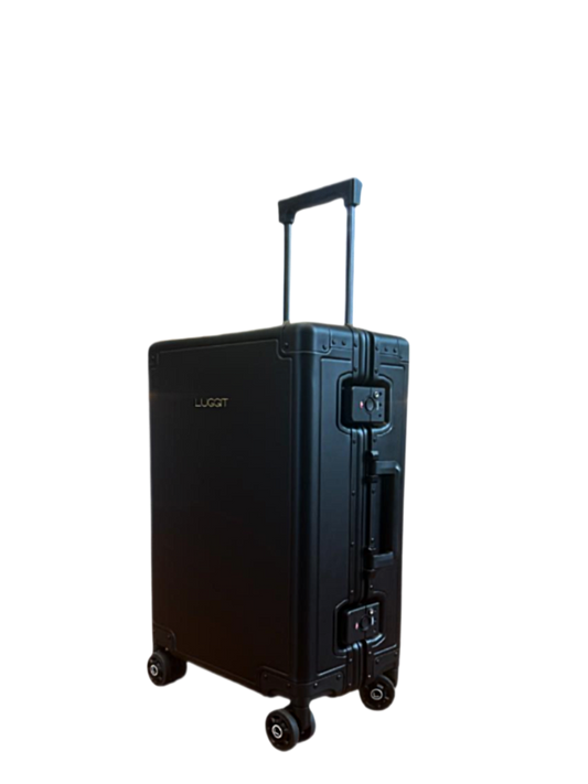 Black suitcase with wheels on a white luggit