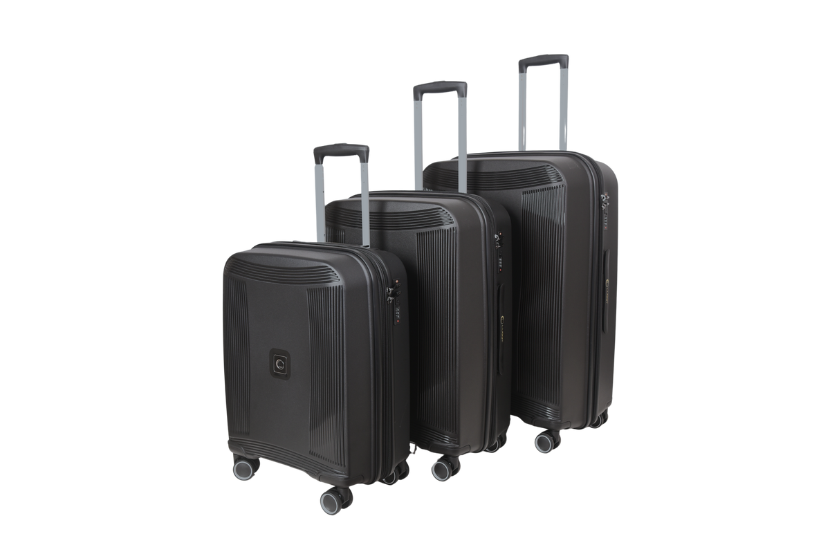Three-piece set of hard-shell spinner suitcases in black, arranged by size, with telescoping handles extended, on a plain white background.