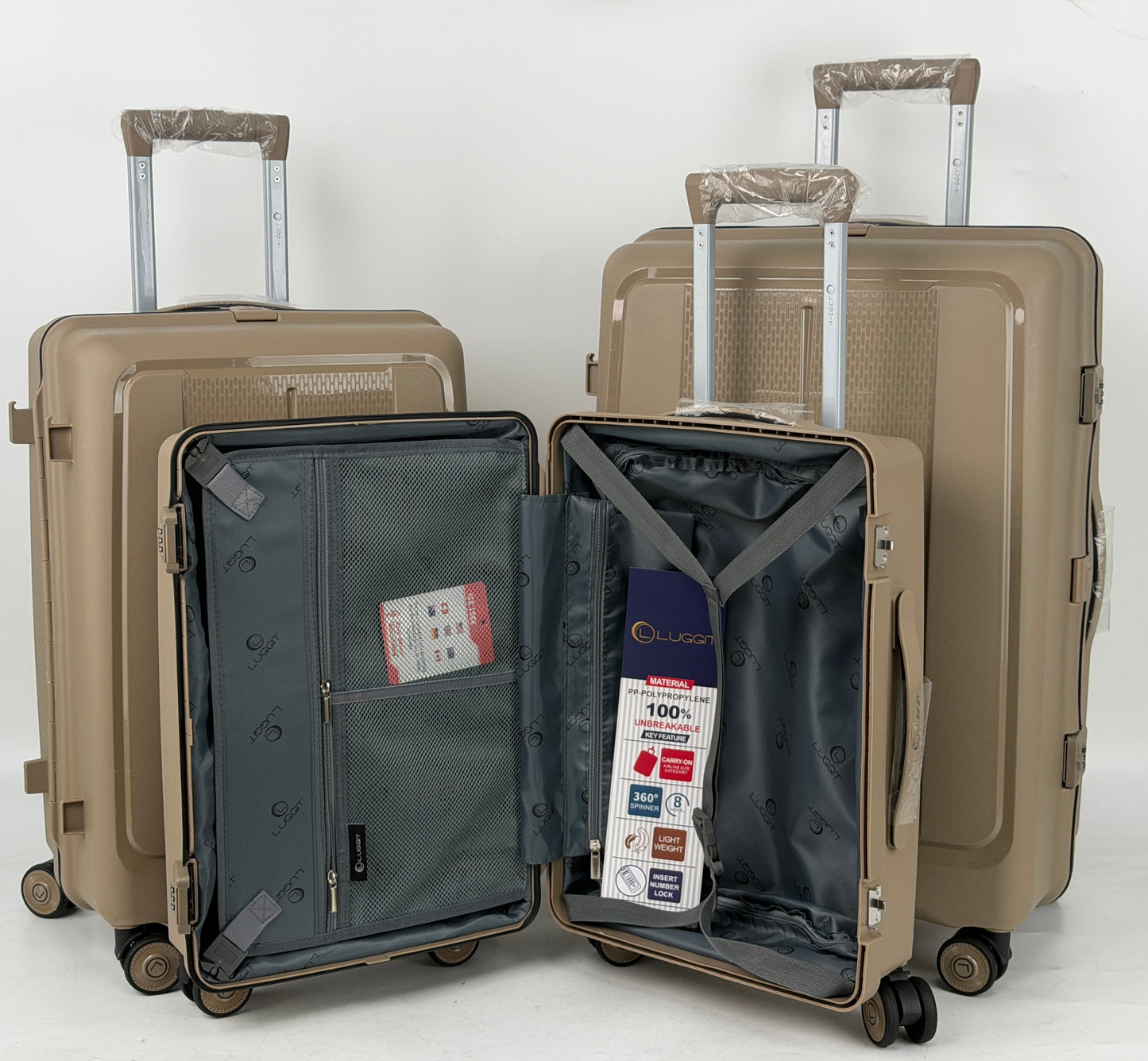 Set of beige suitcases with one open showing interior compartments on a white background