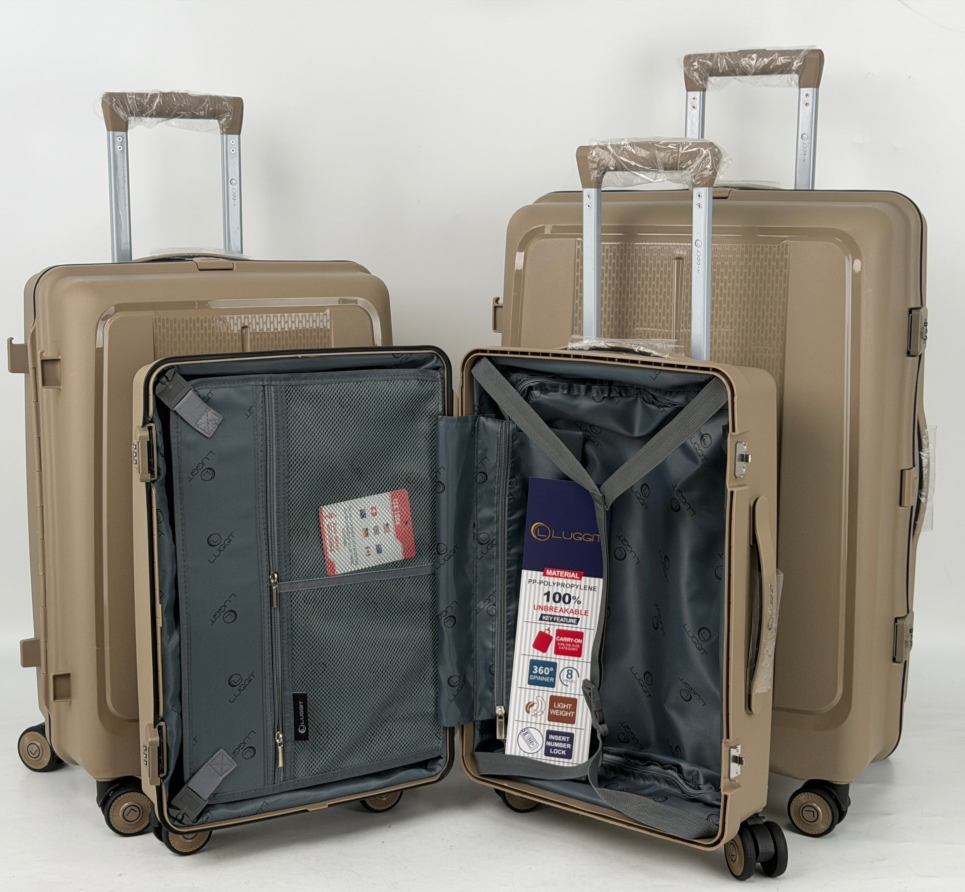 Set of beige suitcases with one open showing interior compartments on a white background