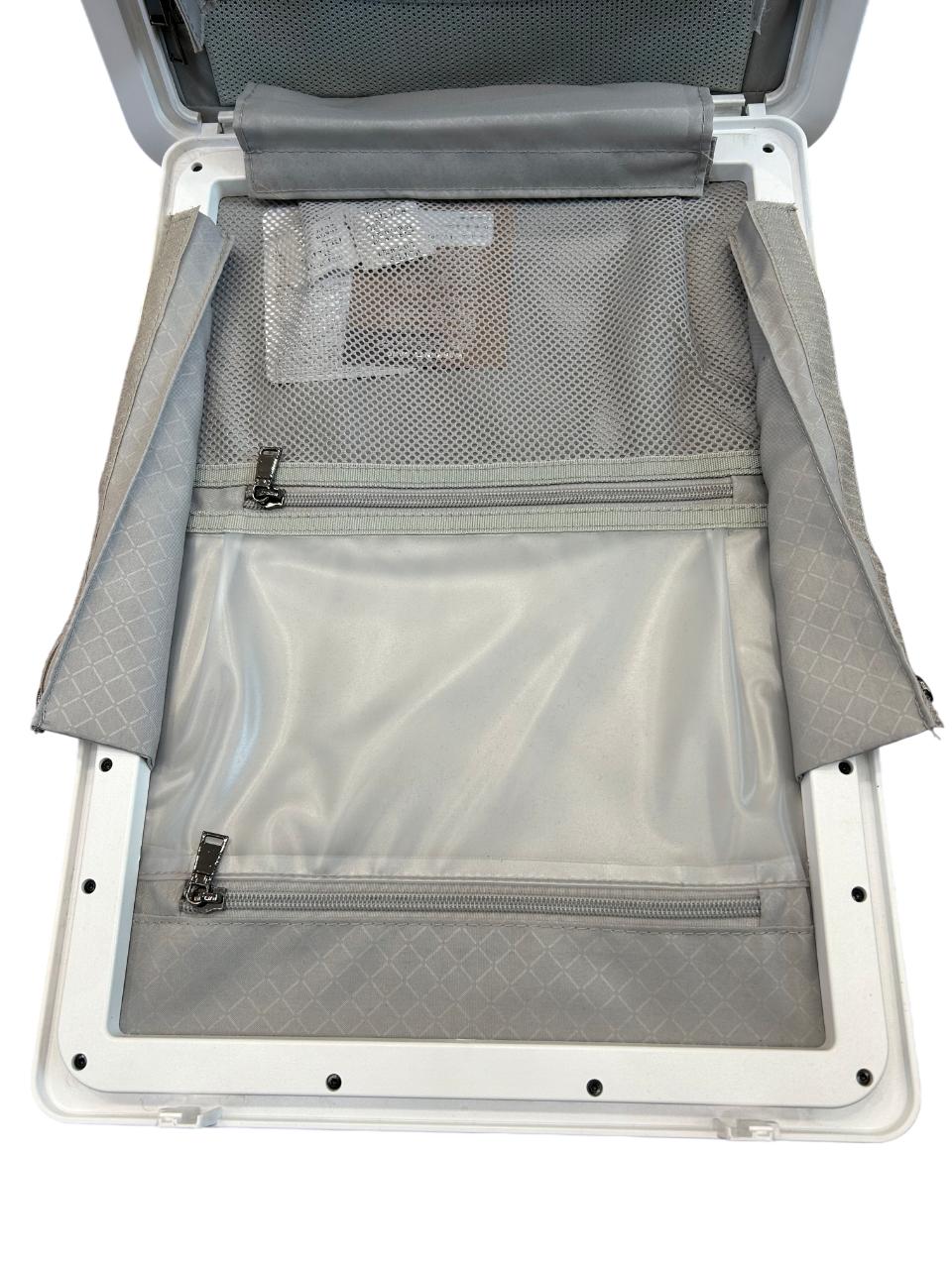 Open gray suitcase with mesh pockets and zippers on a white background