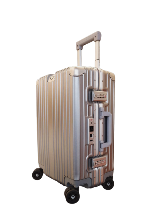 Gold suitcase with wheels and handle on a white background