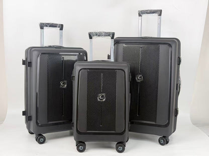 Set of black suitcases of different sizes on a white background