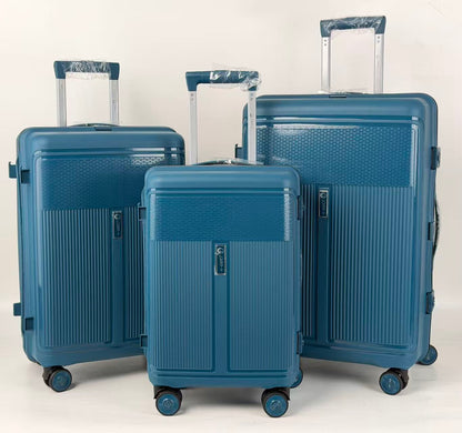 Three blue suitcases of different sizes on a white background