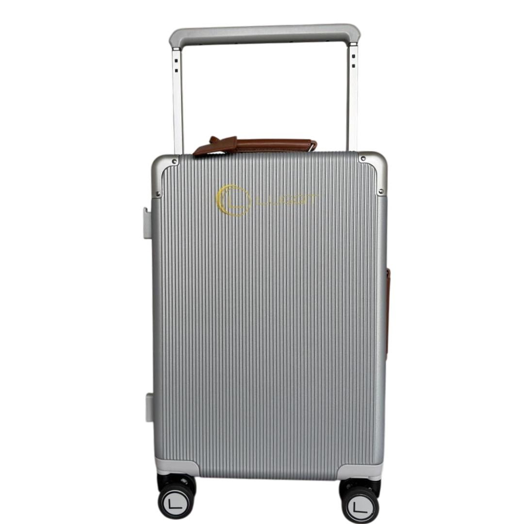 Silver suitcase with a handle on a white background