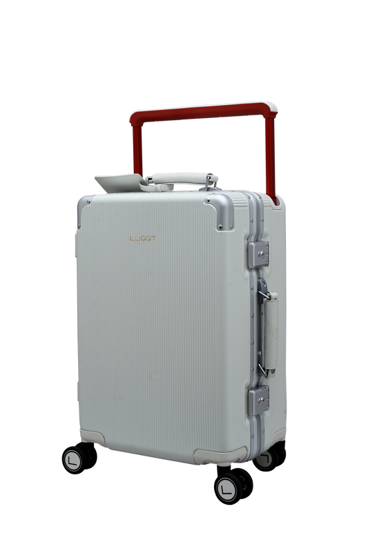white suitcase with a red handle on a white background