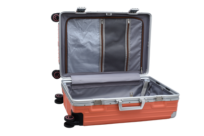 Orange suitcase with open lid on a white background