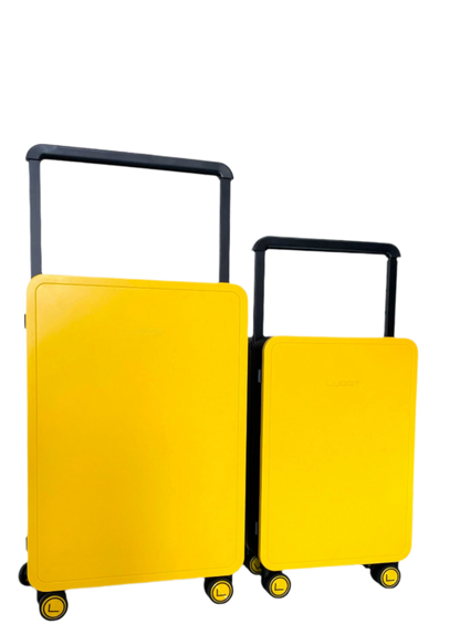 Two yellow suitcases with black handles Luggit