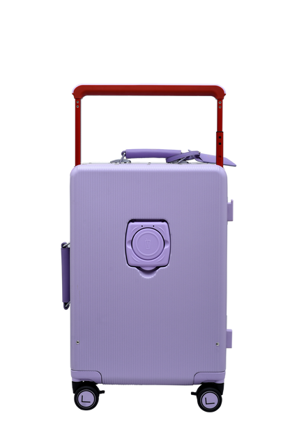 Purple suitcase with a red handle on a white background