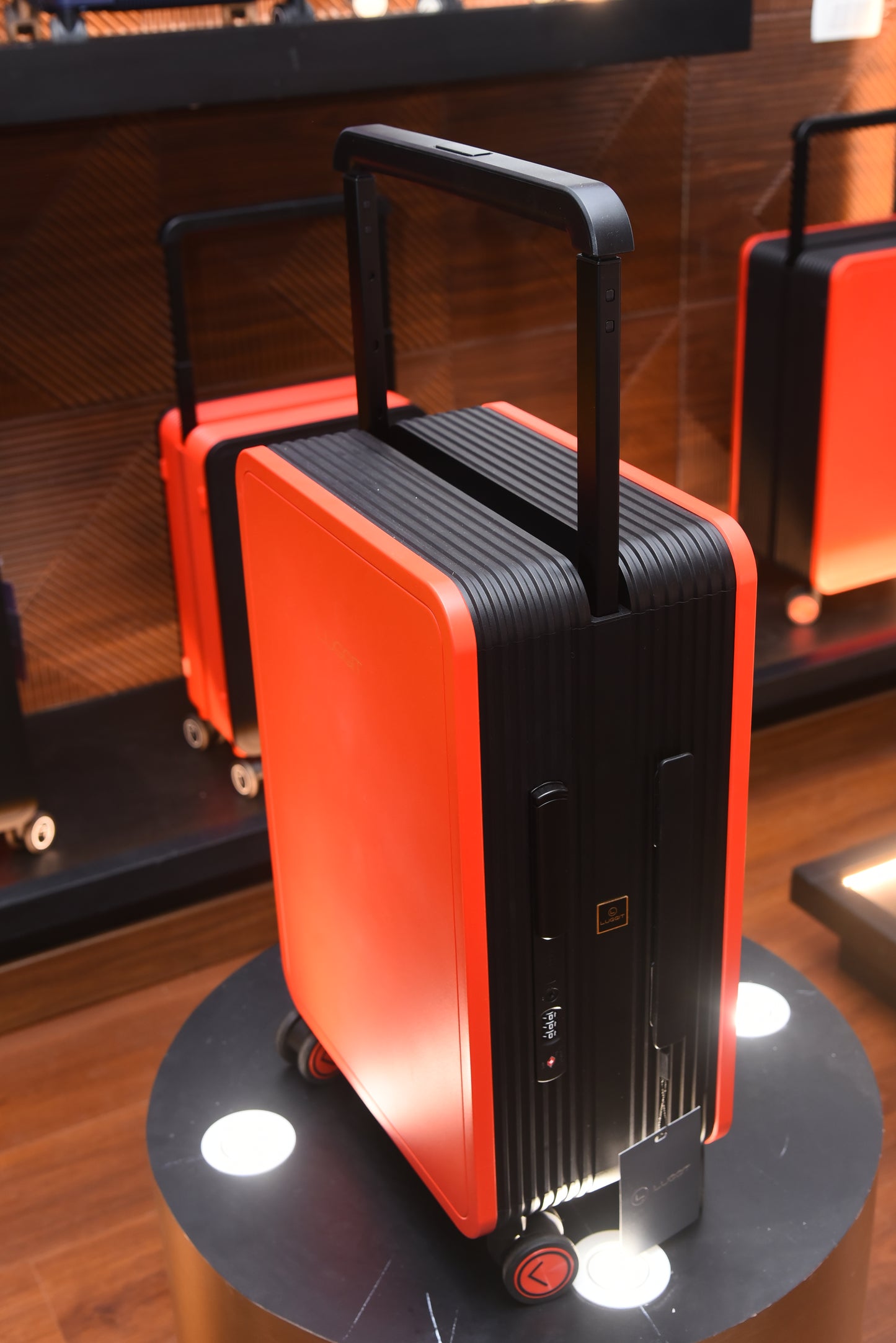 Red and black suitcase luggit