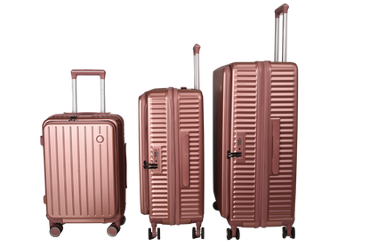 Three hard-shell spinner suitcases in a matching metallic rose gold color, arranged by size from left to right on a plain white background.