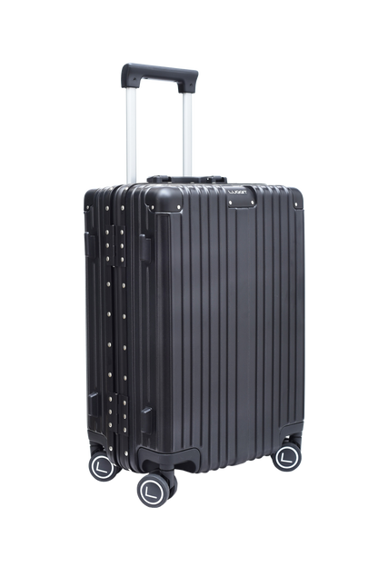 Black suitcase with wheels and handle on a white background