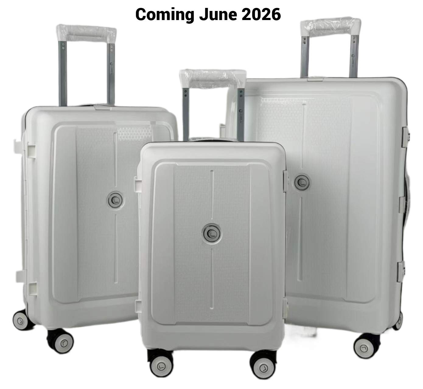 Set of three gray suitcases with 'Coming June 2026' text on a white background