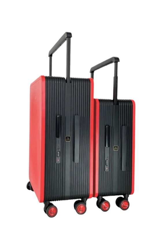 Two suitcases, one red and one black, on a white background